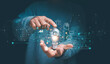 © krungchingpixs - Artificial Intelligence of futuristic innovative technology for business concept, Businessman holding lightbulb with AI and icon of financial technology, Chat and Generate something by AI tech.