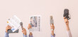 © Pixel-Shot - Female hands with newspapers and microphones on light background