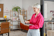 © Pixel-Shot - Beautiful graphic designer working with laptop in office