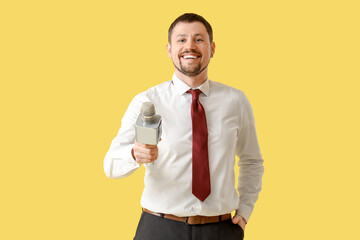 Poster - Male reporter with microphone on yellow background