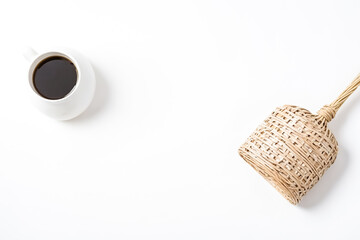 Poster - Wicker Basket and Coffee on a White Table