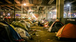 © apratim - A row of colorful tents set up under a city underpass at night, depicting urban homelessness and poverty in a gritty urban environment.
