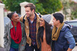 © peopleimages.com - Group, laugh and friends walking to campus, college and university with backpack outdoor. Street, academic people and students with happiness, bonding and travel in Canada for education class