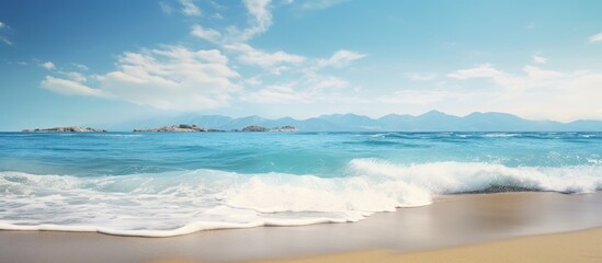Wall Mural - Scenic beach with crashing waves in the background ideal for a copy space image