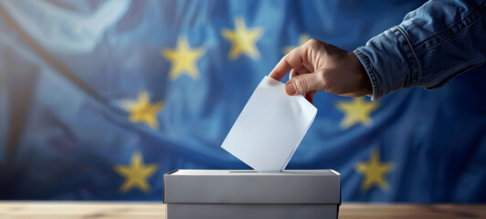 A hand placing a ballot into a box with the European Union flag in the background, symbolizing democratic voting in EU elections	