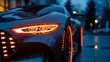 © Atthasit - A close-up view of a car's headlights, featuring intricate neon detailing that adds a touch of personality.