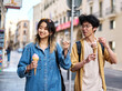 © Lumos sp - city young woman travel tourist outdoor couple happy vacation lifestyle holiday street summer urban tourism traveler town journey trip ice cream dessert food