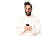 © luismolinero - Young man with beard over isolated chroma key background sending a message with the mobile