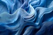 © Sandu - A close up of a blue fabric with a very large wave