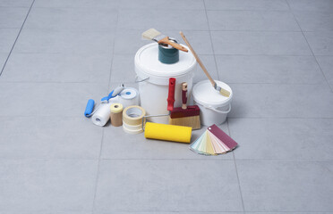 Wall Mural - Painting tools and paint buckets on the floor