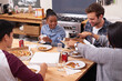 © peopleimages.com - Pizza, people and friends eating in home in celebration of reunion together for bonding fun. Happy, men or hungry women enjoying fast food lunch meal at social gathering with smile in dinner party