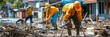 © Ilia Nesolenyi - A group of volunteers stands on a flooded street, working together to clean up debris after a flood disaster