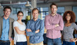 © peopleimages.com - Businesspeople, happy and office with team in portrait for startup or advertisement of company. We are hiring, collaboration and about us with group or partners with pride, ambition and arms crossed.