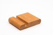 © HüseyinGökmen - Isolated wooden phone stand for mockup design, graphic resource on white background