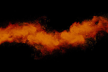 Wall Mural - orange powder explosion on white background. colored cloud. colorful dust explode. paint holi