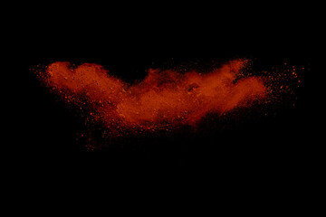 Wall Mural - orange powder explosion on white background. colored cloud. colorful dust explode. paint holi