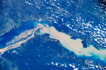 Wall Mural - river landscape in brazil. digital enhancement of an image by nasa