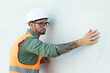 © Have a nice day  - Caucasian Male technician engineer construction worker working in building site wearing safety vest and helmet gears, measuring wall distance analyzing planning constructing of landscape architect.
