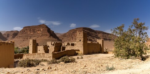 Wall Mural - typical Moroccan adobe ksar in the Ziz Valley in the high Atlas near Achbaro