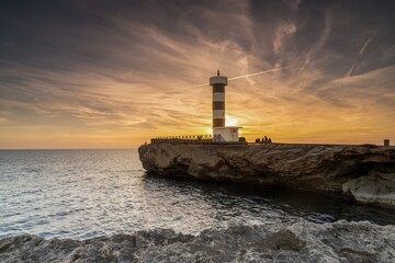 Sticker - view of the lighthouse at Colonia Sant Jordi in Mallorca at sunset