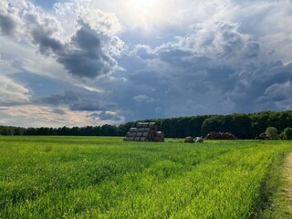 A view of a countryside landscape just before a thunderstorm