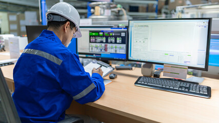 Engineer working at control room,Manager control system,Technician man monitoring program from a lot of monitor