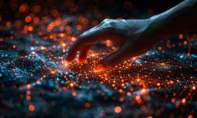 Wall Mural - Hand reaches out to touch glowing network of orange dots.