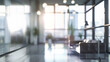 © © Raymond Orton - intentional blurred background of a light modern office interior with panoramic windows and beautiful lighting.