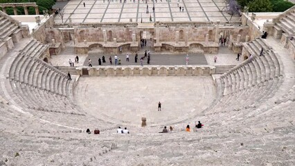 Wall Mural - Roman Theater, Roman ruins, people walk through the amphitheater