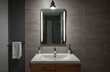 © Mudassir - Closeup water heater in a modern bathroom with mirror and washbasin sink