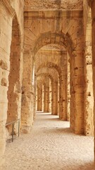 Wall Mural - Well-preserved stone arched gallery for performers to enter on stage in Amphitheater of El Djem, ancient Roman theater in Tunisian city . High quality 4k footage