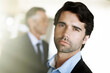 © peopleimages.com - Office, serious and business man in portrait with career goals, pride and attorney of law firm. Professional, advisor or immigration lawyer for legal advice, justice and experience in Canada