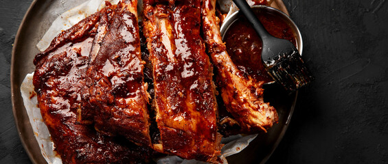 Wall Mural - Grilled and smoked ribs with barbeque sauce.