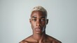 © Papukos - Portrait of an african american man with blonde short hair and blue eyes