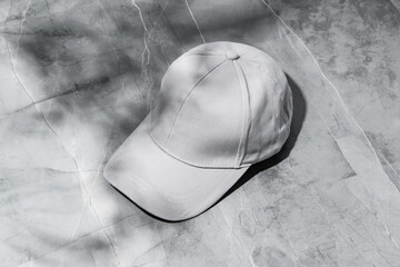 Wall Mural - Baseball cap on gray background studio shot