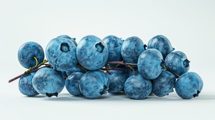 Wall Mural - A tempting bunch of plump blueberries arranged on a white surface, their deep blue hue promising a burst of antioxidant-rich flavor.