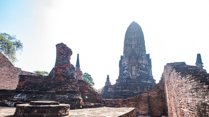 Wall Mural - Ruins of the Chedi Stupa Church And an ancient Buddha image from the Ayutthaya period is in Wat Ratchaburana, an old temple over six hundred years old, Ayutthaya, Thailand.