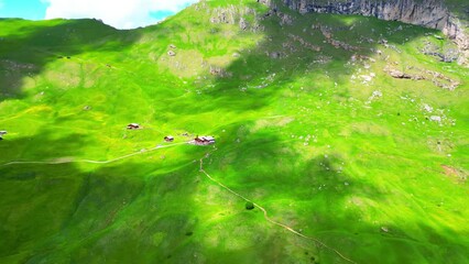 Wall Mural - View from above, stunning aerial view of the mountain range of Seceda during a cloudy day