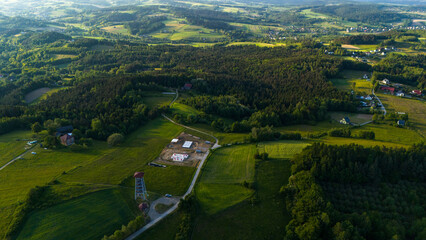 Wall Mural - Lookout Tower in Brusnik, near Ciezkowice in Lesser Poland overlooking hills and farmfields