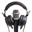 © thongdee - Wireless Microphone on Transparent Background. Podcast concept Directly above view of headphones and recording microphone on orange bag.