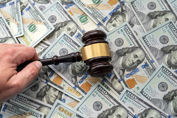 Wall Mural - Judges  gavel on heap of us money. Dolar background. Justice concept