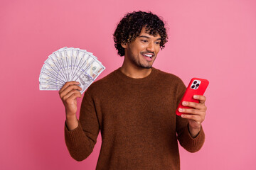 Sticker - Photo of cheerful positive nice man wear trendy clothes earn money isolated on pink color background