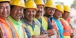 © gunzexx png and bg - A diverse group of male construction workers in safety gear poses for a photo