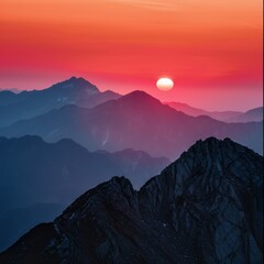 Wall Mural - The sun is setting behind the mountains, casting a warm glow over the landscape