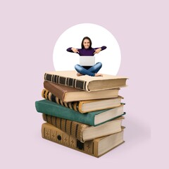 Canvas Print - A woman hold laptop sits on books stack