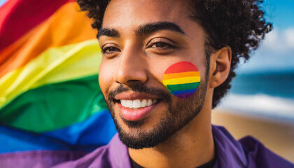 Wall Mural - male face covered with lgbt flag colors close up, queer pride month 