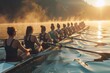© gankevstock - Group of women rowing in a boat during sunrise on calm water