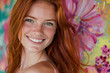 © Emanuel - Beautiful and sensual redhead young woman smiling at the camera, posed against a vibrant colored background