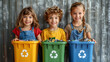 © Ekaterina - Three smiling children holding colorful recycling bins, emphasizing the importance of sustainability and environmental responsibility