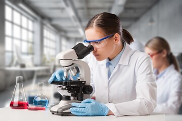 Canvas Print - Oncology doctor do examining sample under microscope,